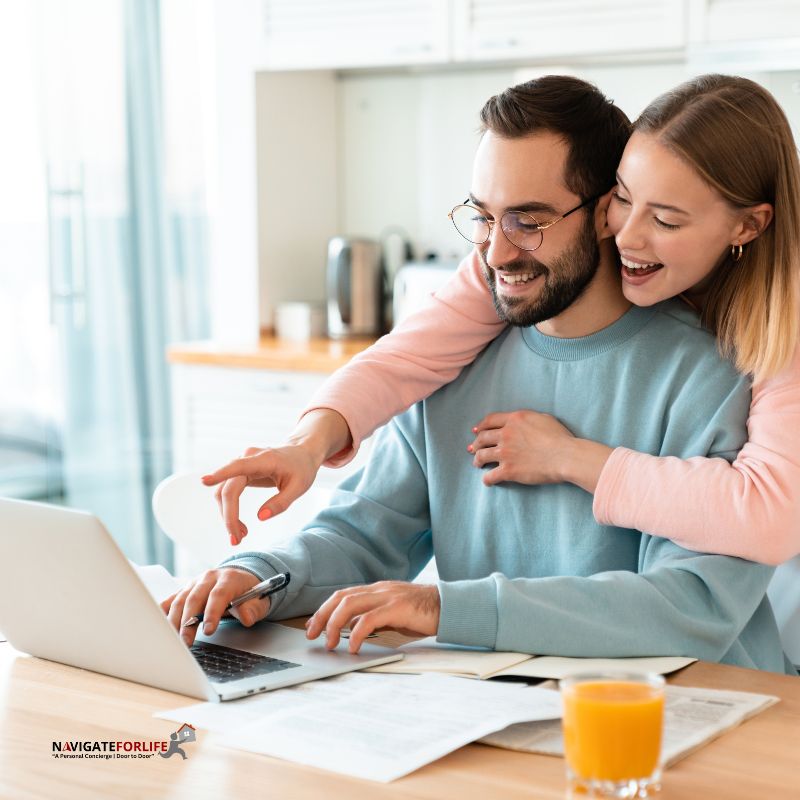 Couple-working-in-front-of-computer